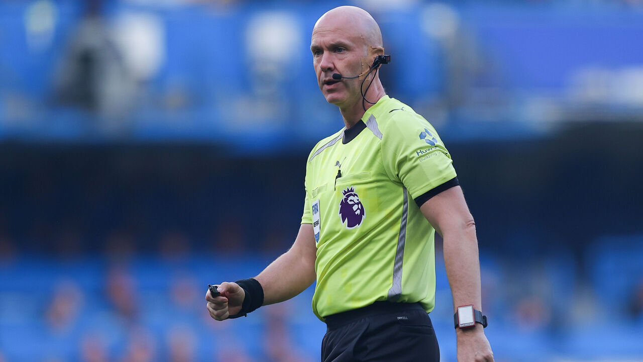 LONDON, ENGLAND - OCTOBER 04: Referee Anthony Taylor is seen wearing a 'refcam' camera during the Premier League match between Chelsea and Liverpool at Stamford Bridge on October 04, 2025 in London, England.