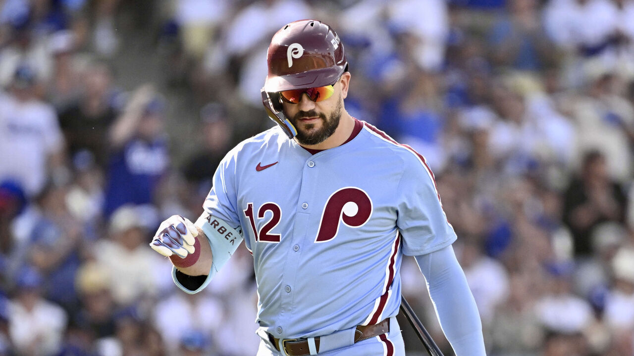 Los Angeles, CA - October 09: Kyle Schwarber #12 of the Philadelphia Phillies reacts after striking out against the Los Angeles Dodgers in the third inning of game 4 of a National League Division series baseball game at Dodger Stadium in Los Angeles on Thursday, October 9, 2025.