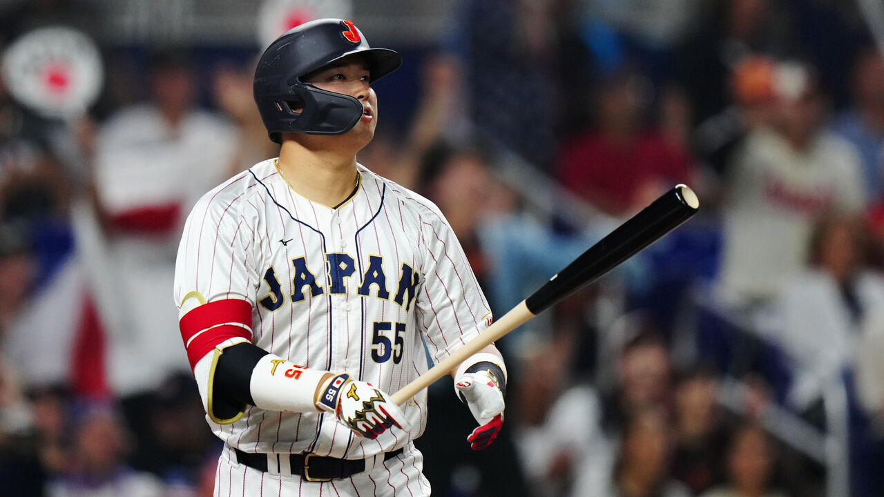 MIAMI, FL - MARCH 21: Munetaka Murakami #55 of Team Japan hits a home run in the second inning during the 2023 World Baseball Classic Championship game between Team USA and Team Japan at loanDepot Park on Tuesday, March 21, 2023 in Miami, Florida.