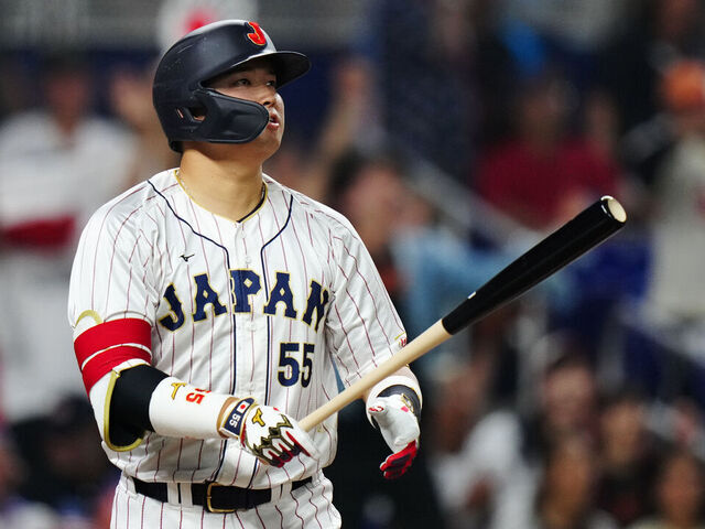 MIAMI, FL - MARCH 21: Munetaka Murakami #55 of Team Japan hits a home run in the second inning during the 2023 World Baseball Classic Championship game between Team USA and Team Japan at loanDepot Park on Tuesday, March 21, 2023 in Miami, Florida.