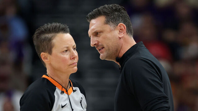 PHOENIX, ARIZONA - OCTOBER 10: Head coach Nate Tibbetts of the Phoenix Mercury speaks with referee Gina Cross in the third quarter against the Las Vegas Aces during game four of the 2025 WNBA Playoffs finals at Mortgage Matchup Center on October 10, 2025 in Phoenix, Arizona.