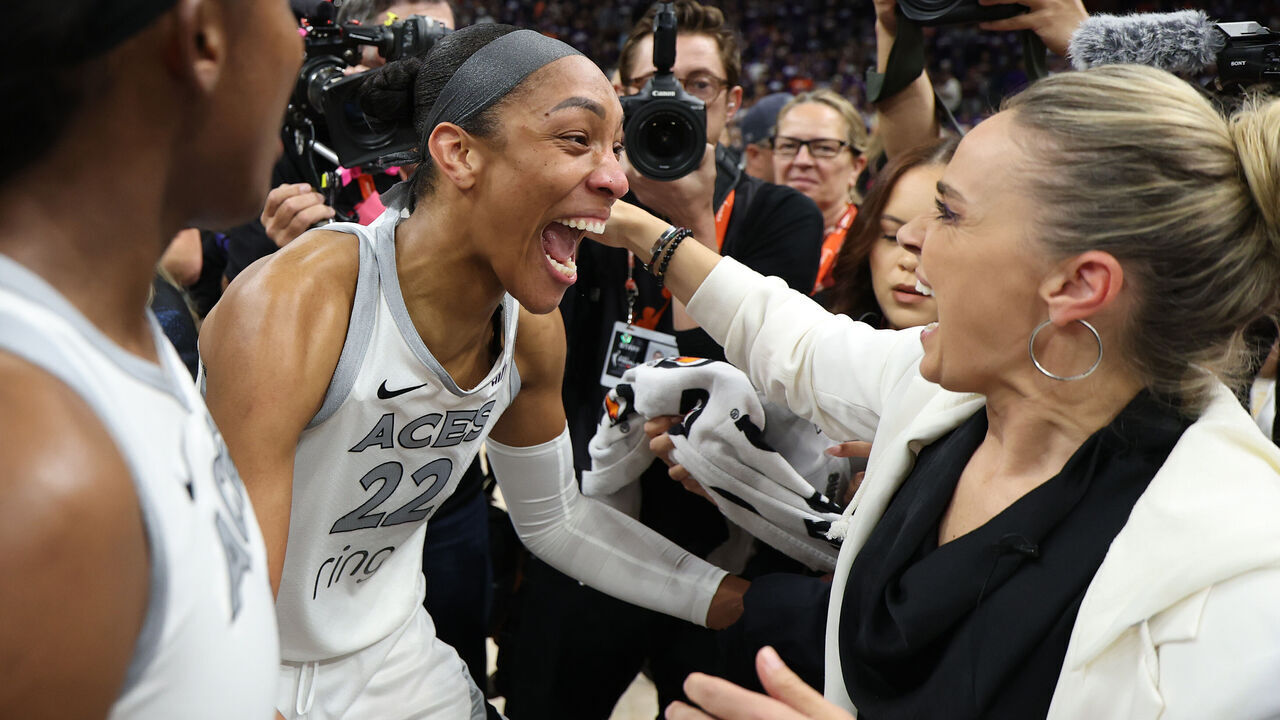 PHOENIX, ARIZONA - OCTOBER 10: A'ja Wilson #22 of the Las Vegas Aces celebrates with head coach Becky Hammon after winning game four of the 2025 WNBA Playoffs finals at Mortgage Matchup Center on October 10, 2025 in Phoenix, Arizona. The Las Vegas Aces defeat the Phoenix Mercury 97-86 to win the championship.