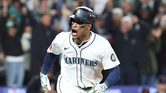 SEATTLE, WASHINGTON - OCTOBER 10: Jorge Polanco #7 of the Seattle Mariners celebrates after hitting the game-winning RBI single during the fifteenth inning against the Detroit Tigers to win game five of the American League Division Series at T-Mobile Park on October 10, 2025 in Seattle, Washington.