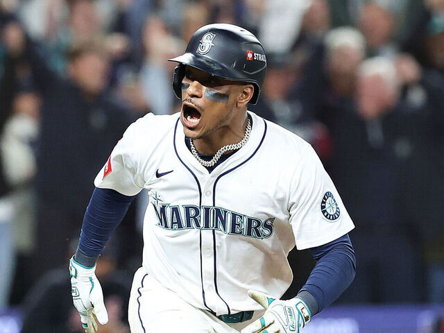 SEATTLE, WASHINGTON - OCTOBER 10: Jorge Polanco #7 of the Seattle Mariners celebrates after hitting the game-winning RBI single during the fifteenth inning against the Detroit Tigers to win game five of the American League Division Series at T-Mobile Park on October 10, 2025 in Seattle, Washington.