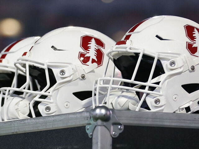 CHARLOTTESVILLE, VA - SEPTEMBER 20: Stanford Cardinal helmets resting on the sidelines during a college football game between the Stanford Cardinal and the Virginia Cavaliers on September 20, 2025, at Scott Stadium in Charlottesville, VA.