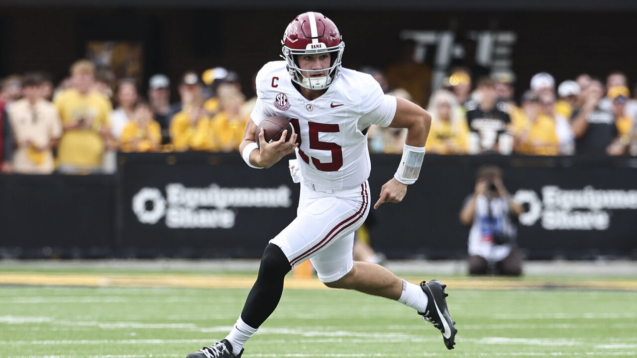 COLUMBIA, MO - OCTOBER 11: Alabama Crimson Tide quarterback Ty Simpson (15) rolls out with the ball in the first quarter of an SEC football game between the Alabama Crimson Tide and Missouri Tigers on October 11, 2025 at Memorial Stadium in Columbia, MO.