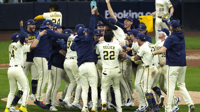 MILWAUKEE, WISCONSIN - OCTOBER 11: The Milwaukee Brewers celebrate after winning game five of the National League Division Series against the Chicago Cubs at American Family Field on October 11, 2025 in Milwaukee, Wisconsin.