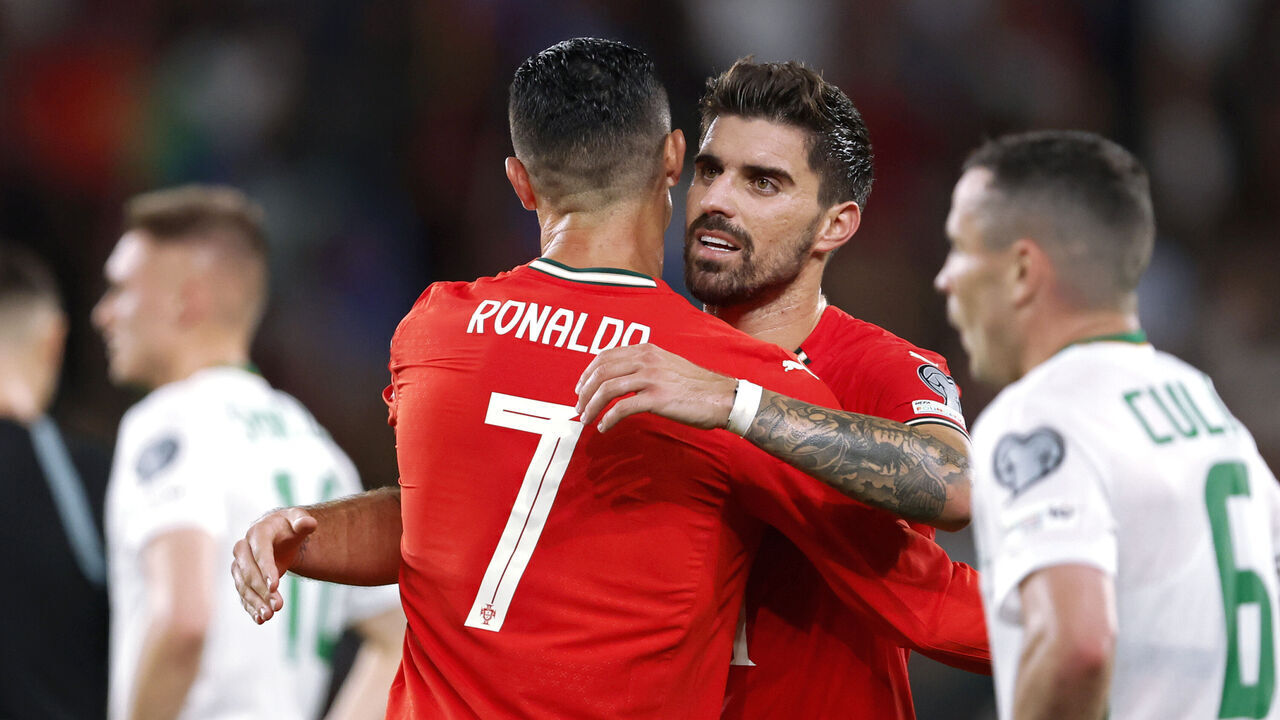 LISBON, PORTUGAL - OCTOBER 11: (L-R) Cristiano Ronaldo of Portugal, Ruben Neves of Portugal celebrating the victory after the match during the World Cup Qualifier match between Portugal v Republic of Ireland at the Estadio Jose Alvalade on October 11, 2025 in Lisbon Portugal