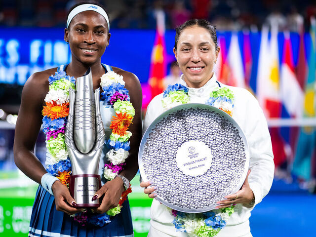 WUHAN, CHINA - OCTOBER 12: Champion Coco Gauff of the United States and runner-up Jessica Pegula of the United States pose with their trophies after the singles final on Day 9 of the Wuhan Open at Optics Valley International Tennis Center on October 12, 2025 in Wuhan, China
