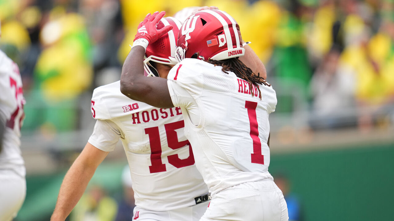 EUGENE, OREGON - OCTOBER 11: Roman Hemby #1 of the Indiana Hoosiers celebrates with Fernando Mendoza #15 after a touchdown during the first half against the Oregon Ducks at Autzen Stadium on October 11, 2025 in Eugene, Oregon.