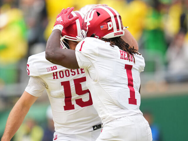 EUGENE, OREGON - OCTOBER 11: Roman Hemby #1 of the Indiana Hoosiers celebrates with Fernando Mendoza #15 after a touchdown during the first half against the Oregon Ducks at Autzen Stadium on October 11, 2025 in Eugene, Oregon.