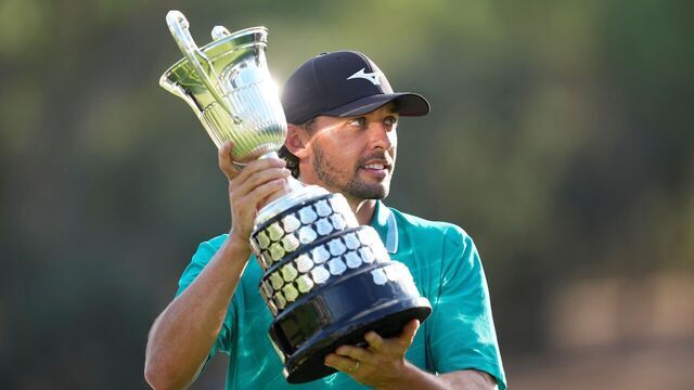 MADRID, SPAIN - OCTOBER 12: Marco Penge of England celebrates with the Champion Trophy during the Open de España presented by Madrid, R4 Final, golf tournament of DP World Tour at Club de Campo Villa de Madrid on October 12, 2025, in Madrid, Spain.