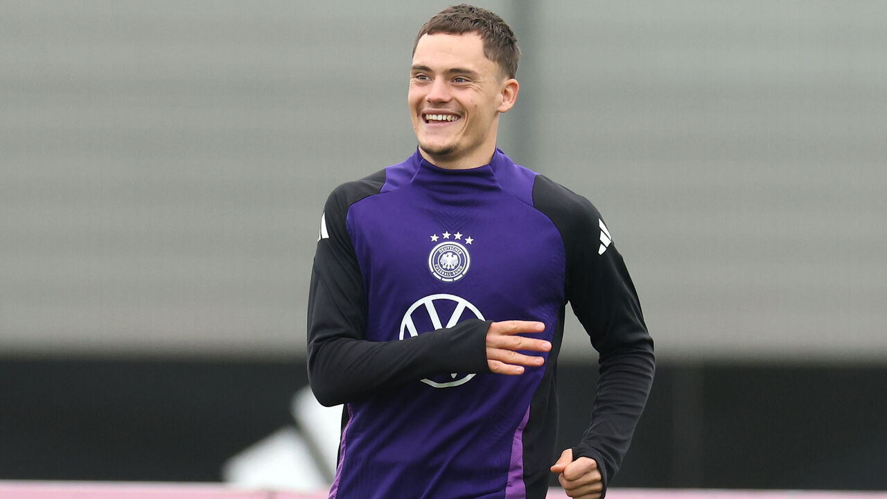 HERZOGENAURACH, GERMANY - OCTOBER 12: Florian Wirtz of Germany smiles during a training session at adidas Homeground on October 12, 2025 in Herzogenaurach, Germany.