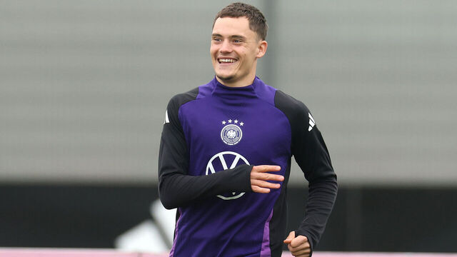 HERZOGENAURACH, GERMANY - OCTOBER 12: Florian Wirtz of Germany smiles during a training session at adidas Homeground on October 12, 2025 in Herzogenaurach, Germany.