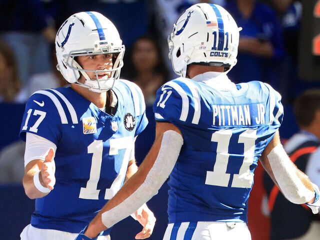 INDIANAPOLIS, INDIANA - OCTOBER 12: Daniel Jones #17 of the Indianapolis Colts celebrates a touchdown with Michael Pittman #11 of the Indianapolis Colts during the second quarter against the Arizona Cardinals in the game at Lucas Oil Stadium on October 12, 2025 in Indianapolis, Indiana.