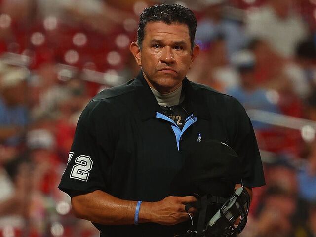 ST LOUIS, MISSOURI - JULY 24: Umpire Alfonso Marquez #72 works a game between the St. Louis Cardinals and the San Diego Padres. at Busch Stadium on July 24, 2025 in St Louis, Missouri.