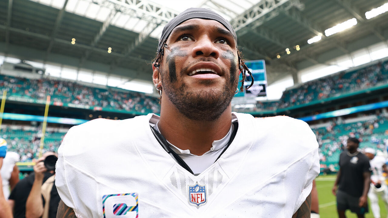 MIAMI GARDENS, FLORIDA - OCTOBER 12: Tua Tagovailoa #1 of the Miami Dolphins leaves the field after a loss against the Los Angeles Chargers following the game at Hard Rock Stadium on October 12, 2025 in Miami Gardens, Florida.