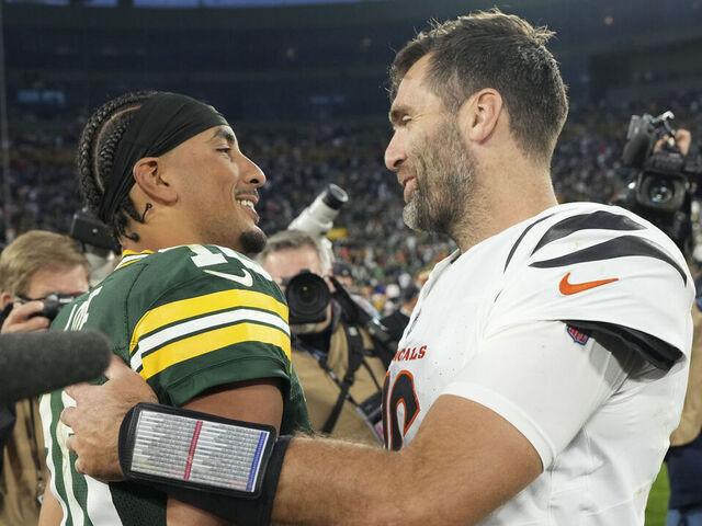 GREEN BAY, WISCONSIN - OCTOBER 12: Jordan Love #10 of the Green Bay Packers and Joe Flacco #16 of the Cincinnati Bengals interact after an NFL football game at Lambeau Field on October 12, 2025 in Green Bay, Wisconsin.