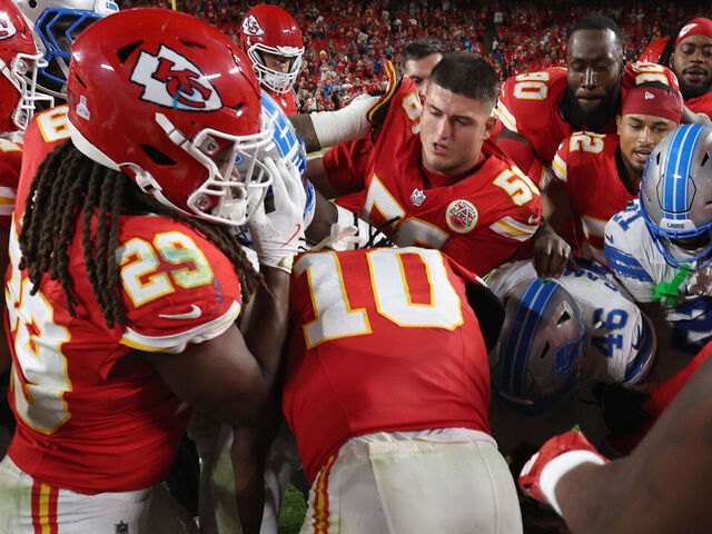 KANSAS CITY, MISSOURI - OCTOBER 12: The Kansas City Chiefs and the Detroit Lions fight after the game at Arrowhead Stadium on October 12, 2025 in Kansas City, Missouri.