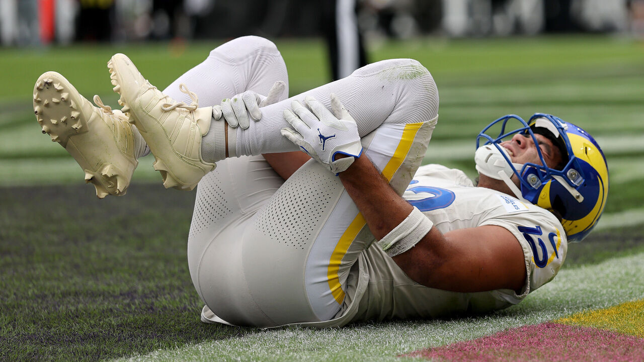 BALTIMORE, MARYLAND - OCTOBER 12: Puka Nacua #12 of the Los Angeles Rams reacts after suffering an injury during the second quarter against the Baltimore Ravens in the game at M&T Bank Stadium on October 12, 2025 in Baltimore, Maryland.