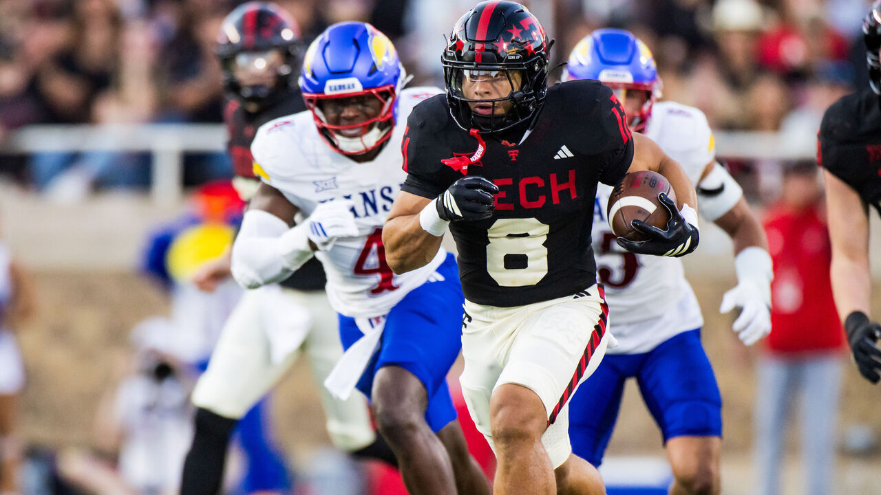 LUBBOCK, TEXAS - OCTOBER 11: Cameron Dickey #8 of the Texas Tech Red Raiders runs for a touchdown during the first half of the game against the Kansas Jayhawks at Jones AT&T Stadium on October 11, 2025 in Lubbock, Texas.