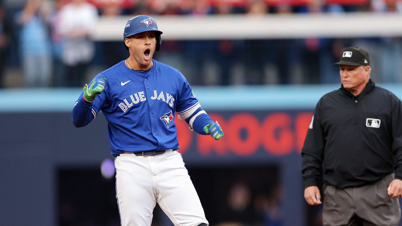 TORONTO, ON - OCTOBER 13: George Springer #4 of the Toronto Blue Jays celebrates on second base after hitting a double in the first inning during Game Two of the American League Championship Series presented by Booking.com between the Seattle Mariners and the Toronto Blue Jays at Rogers Centre on Monday, October 13, 2025 in TorontoOntario, Canada.