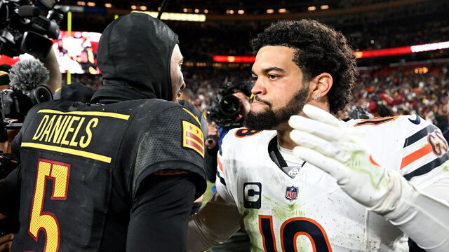 LANDOVER, MARYLAND - OCTOBER 27: Jayden Daniels #5 of the Washington Commanders and Caleb Williams #18 of the Chicago Bears embrace after the game at Northwest Stadium on October 27, 2024 in Landover, Maryland.