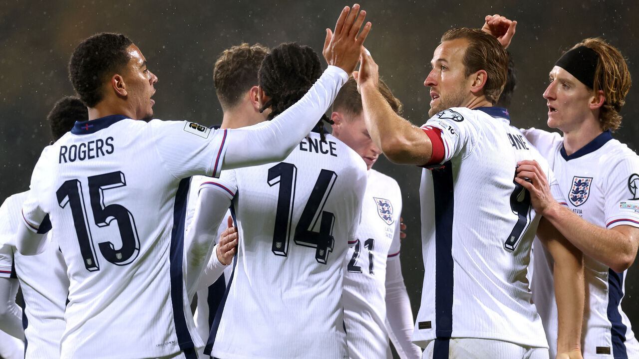 RIGA, LATVIA - OCTOBER 14: Players of England celebrate their team's fourth goal, an own goal scored by Maksims Tonisevs of Latvia (not pictured) during the FIFA World Cup 2026 qualifier match between Latvia and England at Daugava Stadium on October 14, 2025 in Riga, Latvia.