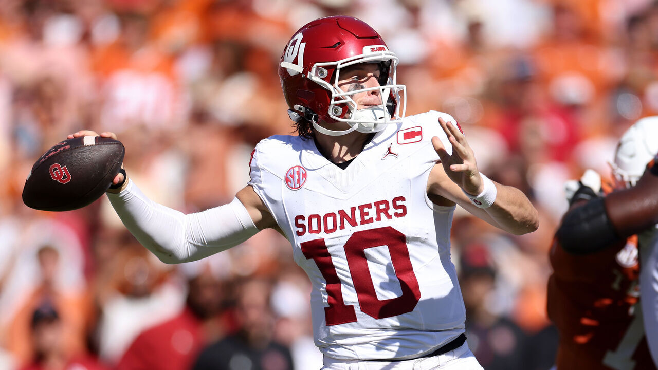 DALLAS, TEXAS - OCTOBER 11: John Mateer #10 of the Oklahoma Sooners throws a pass in the first half against the Texas Longhorns at Cotton Bowl on October 11, 2025 in Dallas, Texas.