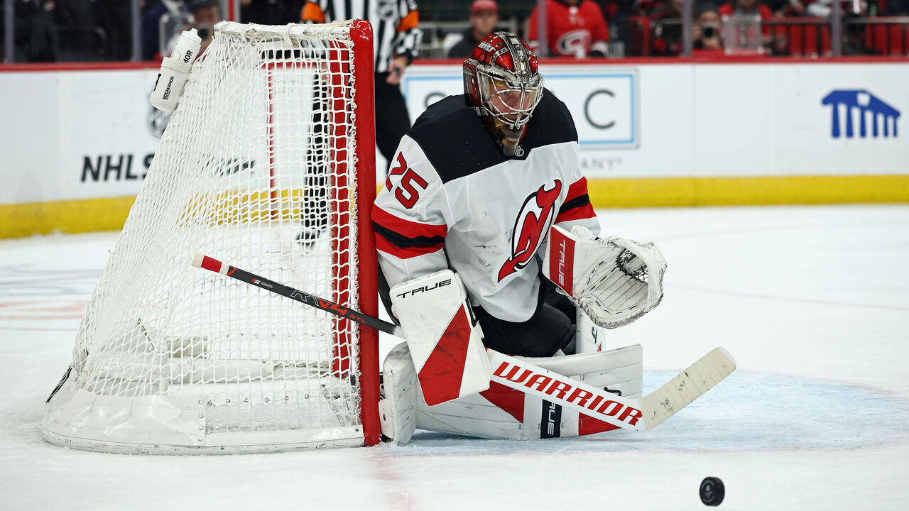 RALEIGH, NORTH CAROLINA - OCTOBER 09: Jacob Markstrom #25 of the New Jersey Devils protects the net during the second period of the game against the Carolina Hurricanes at Lenovo Center on October 09, 2025 in Raleigh, North Carolina.