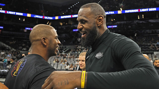 SAN ANTONIO, TX - NOVEMBER 15: Chris Paul #3 of the San Antonio Spurs greets LeBron James #23 of the Los Angeles Lakers before the start of the Emirates NBA Cup game at the Frost Bank Center on November 15, 2024 in San Antonio, Texas. NOTE TO USER: User expressly acknowledges and agrees that, by downloading and or using this photograph, User is consenting to terms and conditions of the Getty Images License Agreement.
