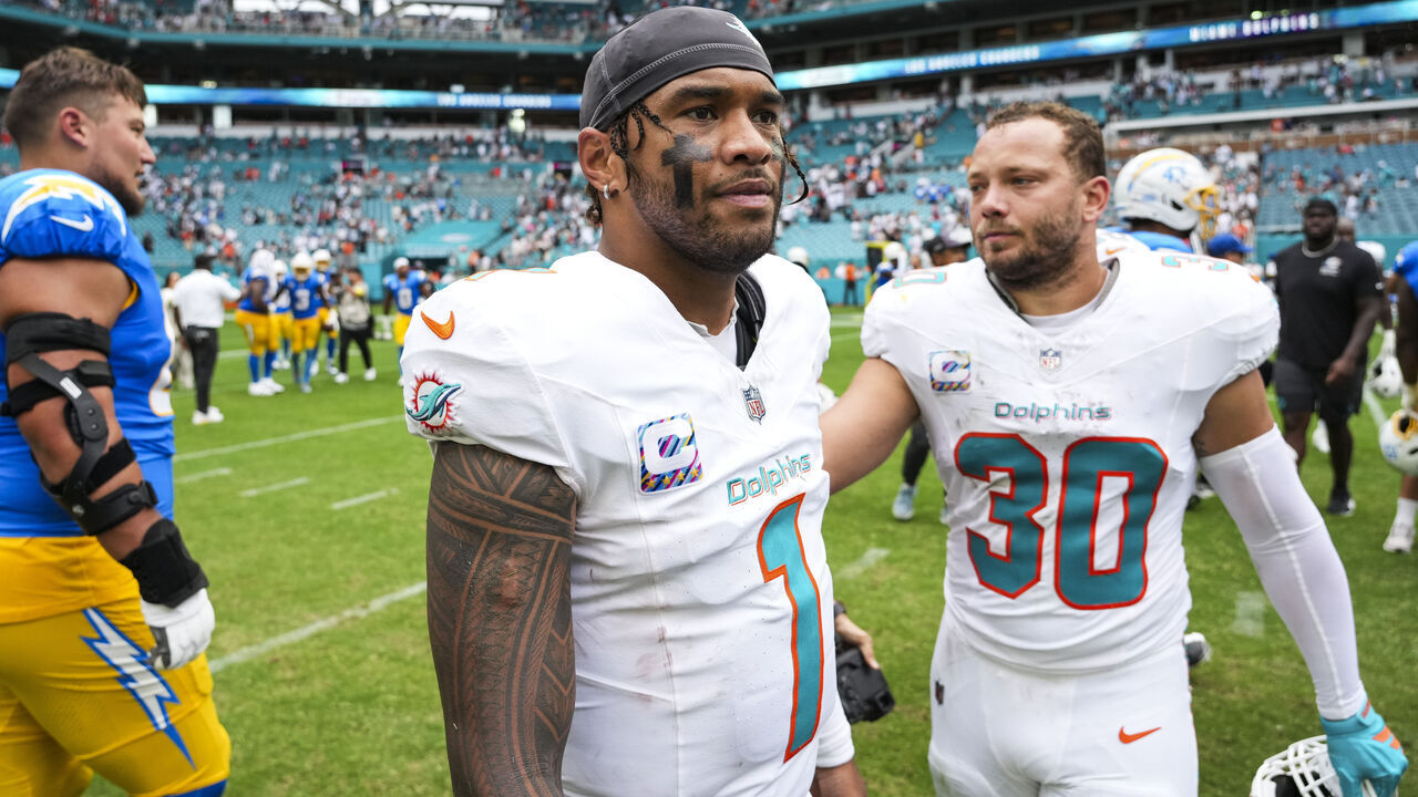 MIAMI GARDENS, FLORIDA - OCTOBER 12: Tua Tagovailoa #1 of the Miami Dolphins looks on from the field after an NFL football game against the Los Angeles Chargers at Hard Rock Stadium on October 12, 2025 in Miami Gardens, Florida.