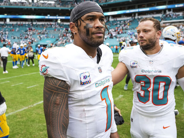 MIAMI GARDENS, FLORIDA - OCTOBER 12: Tua Tagovailoa #1 of the Miami Dolphins looks on from the field after an NFL football game against the Los Angeles Chargers at Hard Rock Stadium on October 12, 2025 in Miami Gardens, Florida.