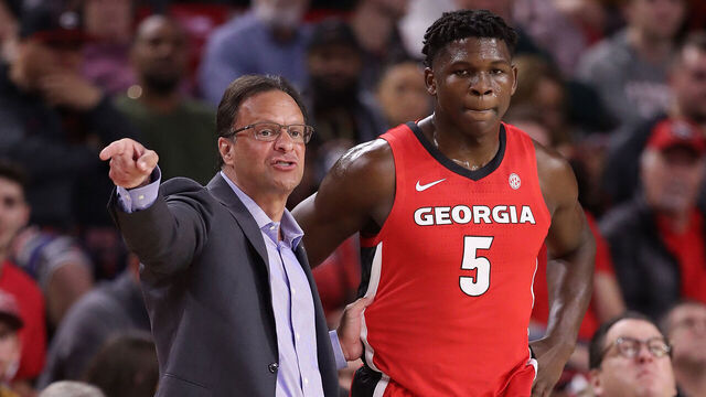 TEMPE, ARIZONA - DECEMBER 14: Head coach Tom Crean of the Georgia Bulldogs talks with Anthony Edwards #5 during the first half of the NCAAB game against the Arizona State Sun Devils at Desert Financial Arena on December 14, 2019 in Tempe, Arizona. The Sun Devils defeated the Bulldogs 79-59.