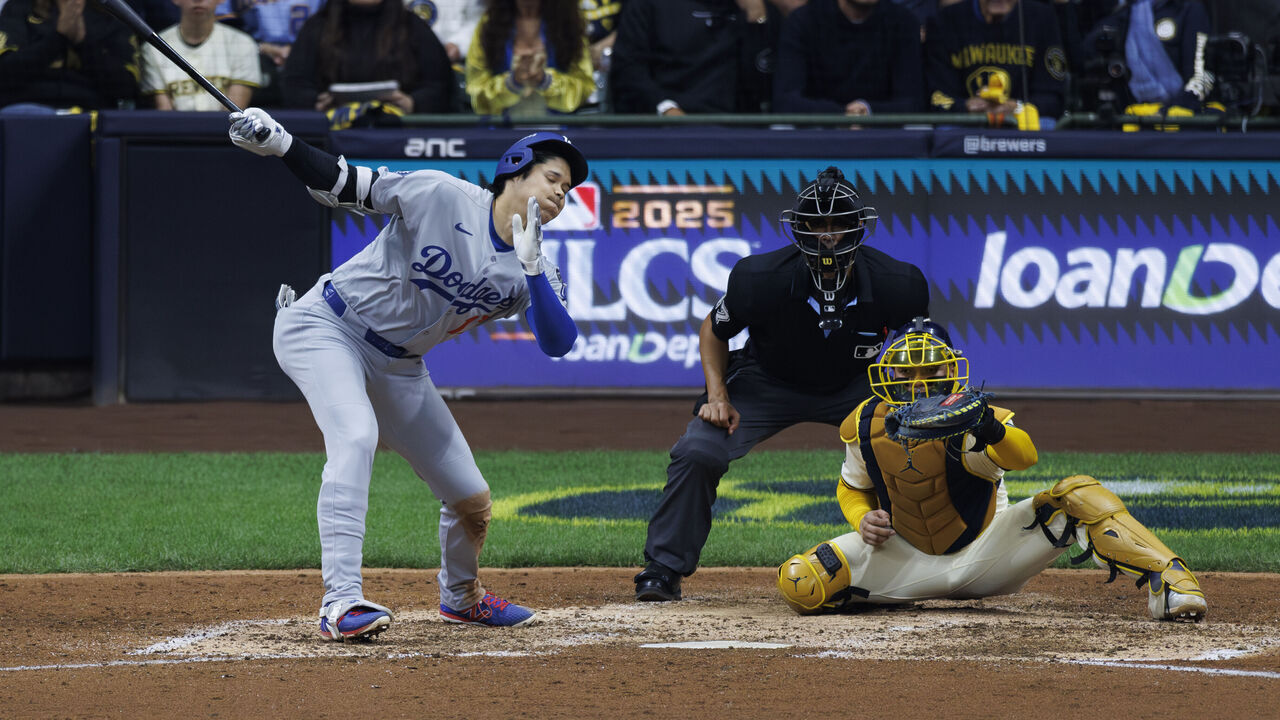 MILWAUKEE, WI- OCTOBER 14, 2025: Los Angeles Dodgers designated hitter Shohei Ohtani (17) strikes out on a ball way outside the strike zone with the bases loaded in the eighth inning during Game 2 of the NLCS at American Family Field on October 14, 2025 in Milwaukee, Wisconsin.(Gina Ferazzi / Los Angeles Times via Getty Images)