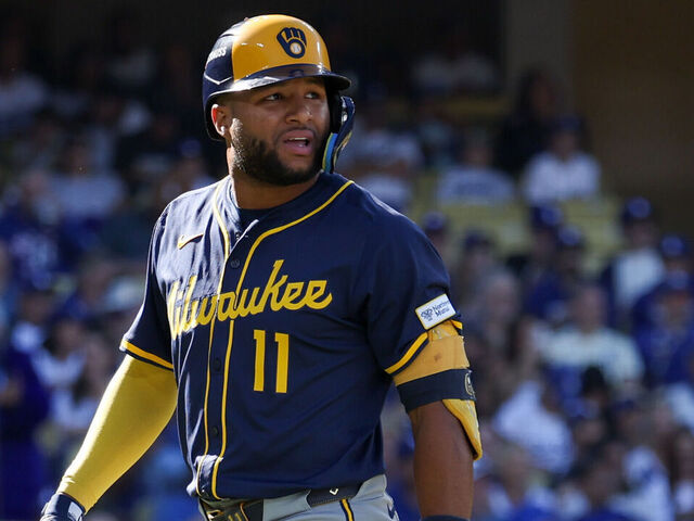 LOS ANGELES, CA - OCTOBER 16: Jackson Chourio #11 of the Milwaukee Brewers leaves the field in the first inning during Game Three of the National League Championship Series presented by loanDepot between the Milwaukee Brewers and the Los Angeles Dodgers at Dodger Stadium on Thursday, October 16, 2025 in Los Angeles, California.