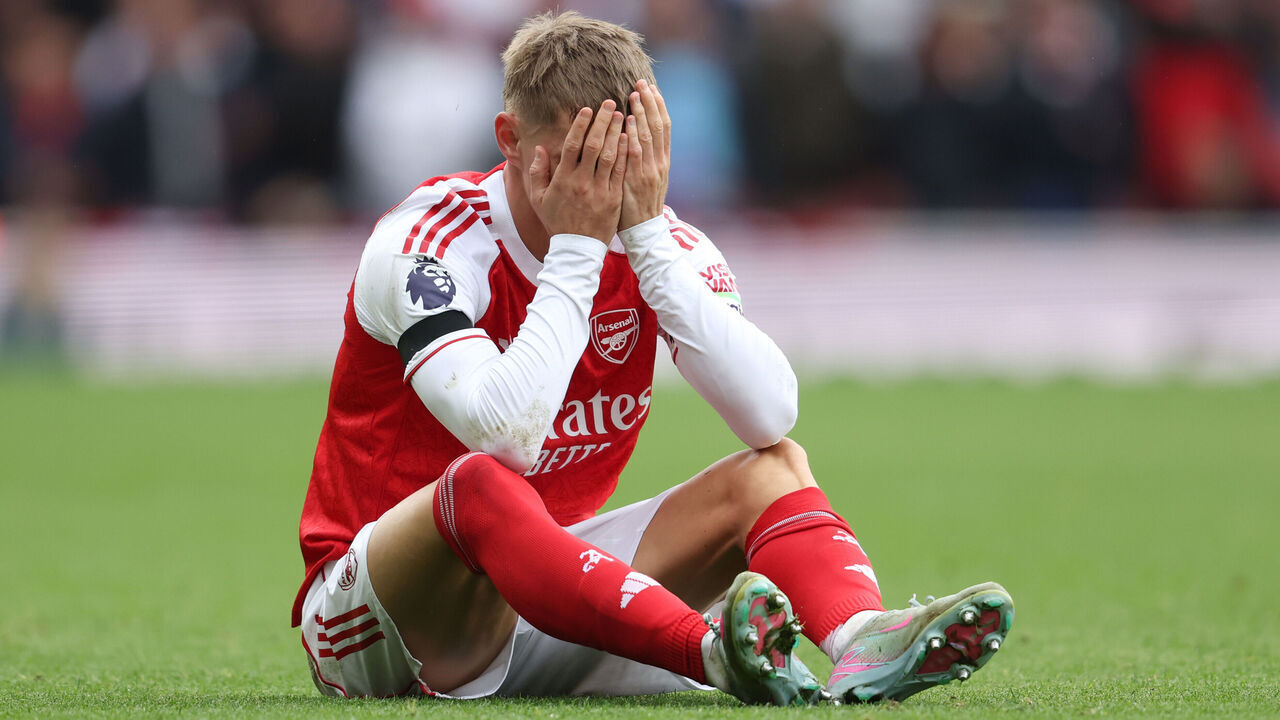 LONDON, ENGLAND - OCTOBER 4: Arsenal's Martin Odegaard sustains an injury during the Premier League match between Arsenal and West Ham United at Emirates Stadium on October 4, 2025 in London, England.