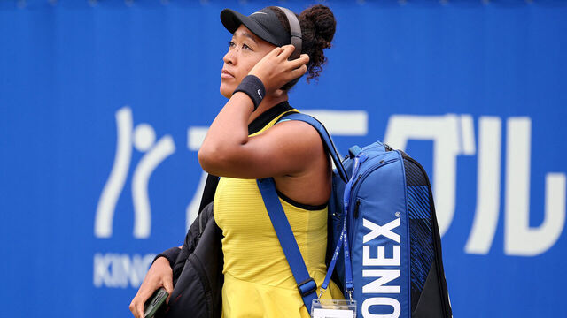 Japan's Naomi Osaka arrives to play against Netherlands' Suzan Lamens during their women's singles match at the Japan Open tennis tournament in Osaka on October 15, 2025.