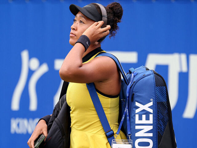 Japan's Naomi Osaka arrives to play against Netherlands' Suzan Lamens during their women's singles match at the Japan Open tennis tournament in Osaka on October 15, 2025.