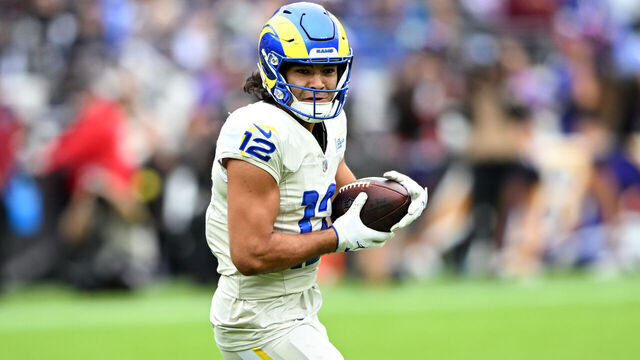 BALTIMORE, MARYLAND - OCTOBER 12: Puka Nacua #12 of the Los Angeles Rams runs with the ball after a reception during the second quarter against the Baltimore Ravens in the game at M&T Bank Stadium on October 12, 2025 in Baltimore, Maryland.