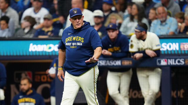 MILWAUKEE, WI - OCTOBER 14: Manager Pat Murphy #49 of the Milwaukee Brewers makes a pitching change during Game Two of the National League Championship Series presented by loanDepot between the Los Angeles Dodgers and the Milwaukee Brewers at American Family Field on Tuesday, October 14, 2025 in Milwaukee, Wisconsin.