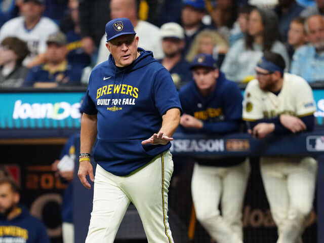 MILWAUKEE, WI - OCTOBER 14: Manager Pat Murphy #49 of the Milwaukee Brewers makes a pitching change during Game Two of the National League Championship Series presented by loanDepot between the Los Angeles Dodgers and the Milwaukee Brewers at American Family Field on Tuesday, October 14, 2025 in Milwaukee, Wisconsin.