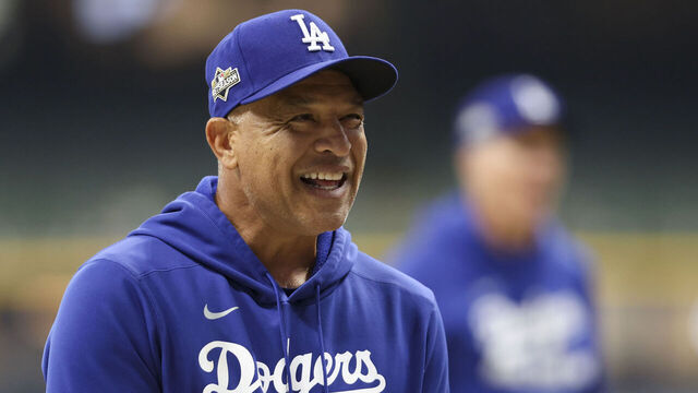 MILWAUKEE, WI - OCTOBER 13: Manager Dave Roberts #30 of the Los Angeles Dodgers looks on during warm ups prior to Game One of the National League Championship Series presented by Booking.com between the Los Angeles Dodgers and the Milwaukee Brewers at American Family Field on Monday, October 13, 2025 in Milwaukee, Wisconsin.