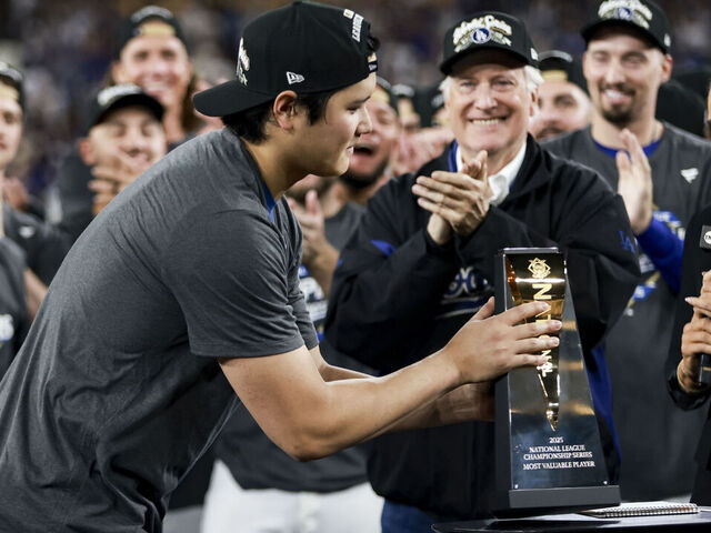 LOS ANGELES, CA - OCTOBER 17: Shohei Ohtani #17 of the Los Angeles Dodgers receives the MVP trophy after Game Four of the National League Championship Series presented by Booking.com between the Milwaukee Brewers and the Los Angeles Dodgers at Dodger Stadium on Friday, October 17, 2025 in Los Angeles, California.
