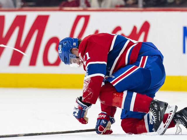 MONTREAL, CANADA- OCTOBER 16: Kaiden Guhle #21 of the Montreal Canadiens is injured on a play during the third period of the NHL regular season game between the Montreal Canadiens and the Nashville Predators at the Bell Centre on October 16, 2025 in Montreal, Quebec, Canada.