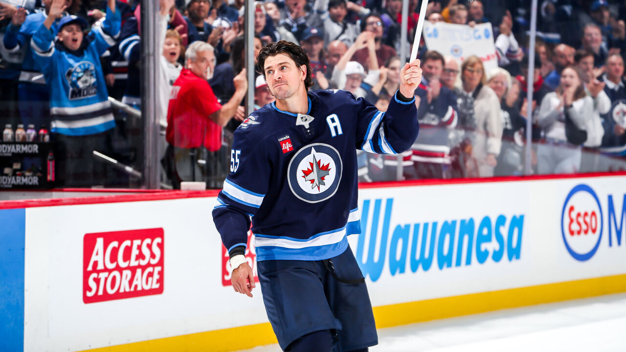 WINNIPEG, CANADA - OCTOBER 11: Mark Scheifele #55 of the Winnipeg Jets salutes the fans after receiving first star honours following a 3-2 victory over the Los Angeles Kings at the Canada Life Centre on October 11, 2025 in Winnipeg, Manitoba, Canada.