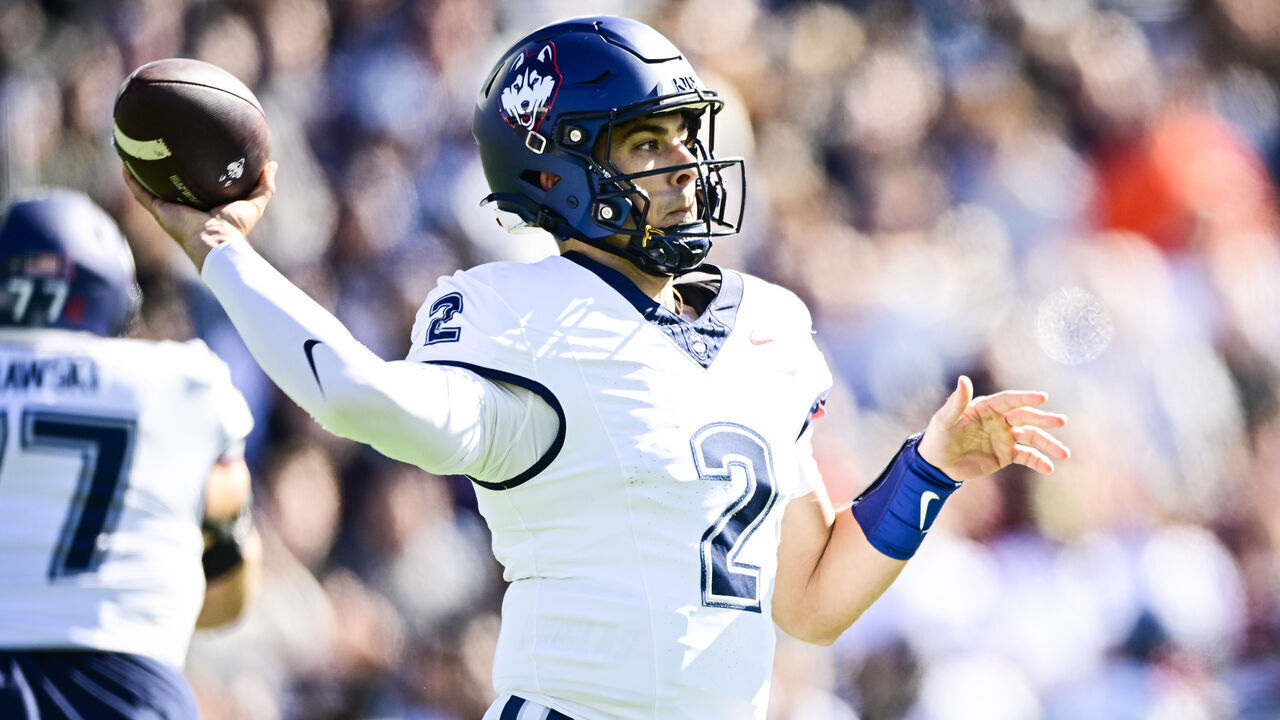 CHESTNUT HILL, MASSACHUSETTS - OCTOBER 18: Joe Fagnano #2 of the UConn Huskies looks to make a pass during the first quarter of a game against Boston College Eagles at Alumni Stadium on October 18, 2025 in Chestnut Hill, Massachusetts.