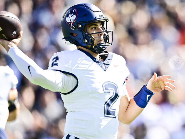 CHESTNUT HILL, MASSACHUSETTS - OCTOBER 18: Joe Fagnano #2 of the UConn Huskies looks to make a pass during the first quarter of a game against Boston College Eagles at Alumni Stadium on October 18, 2025 in Chestnut Hill, Massachusetts.