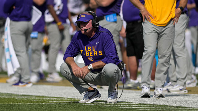 NASHVILLE, TENNESSEE - OCTOBER 18: Head Coach Brian Kelly of the LSU Tigers squats on the sideline in the second half against the Vanderbilt Commodores at FirstBank Stadium on October 18, 2025 in Nashville, Tennessee.