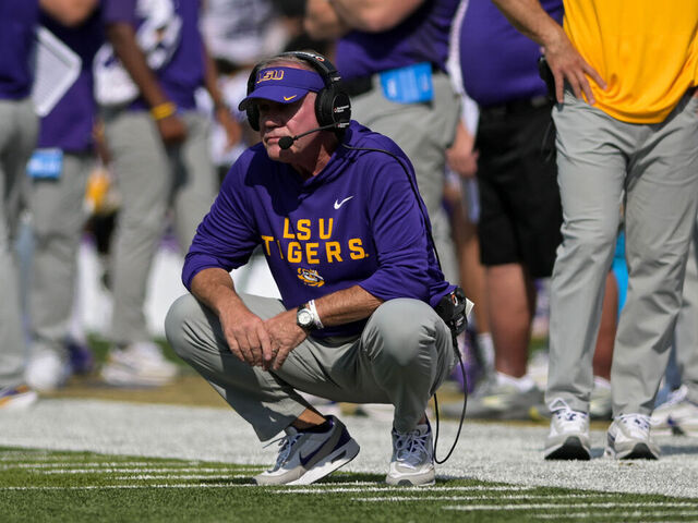 NASHVILLE, TENNESSEE - OCTOBER 18: Head Coach Brian Kelly of the LSU Tigers squats on the sideline in the second half against the Vanderbilt Commodores at FirstBank Stadium on October 18, 2025 in Nashville, Tennessee.